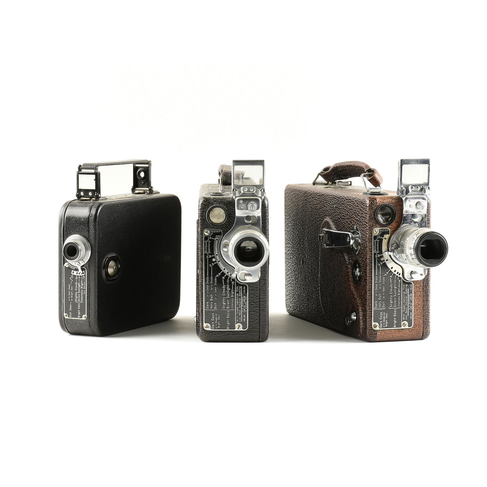 A GROUP OF THREE VINTAGE CINÃ‰ KODAK MOVIE CAMERAS, (1 of 7)