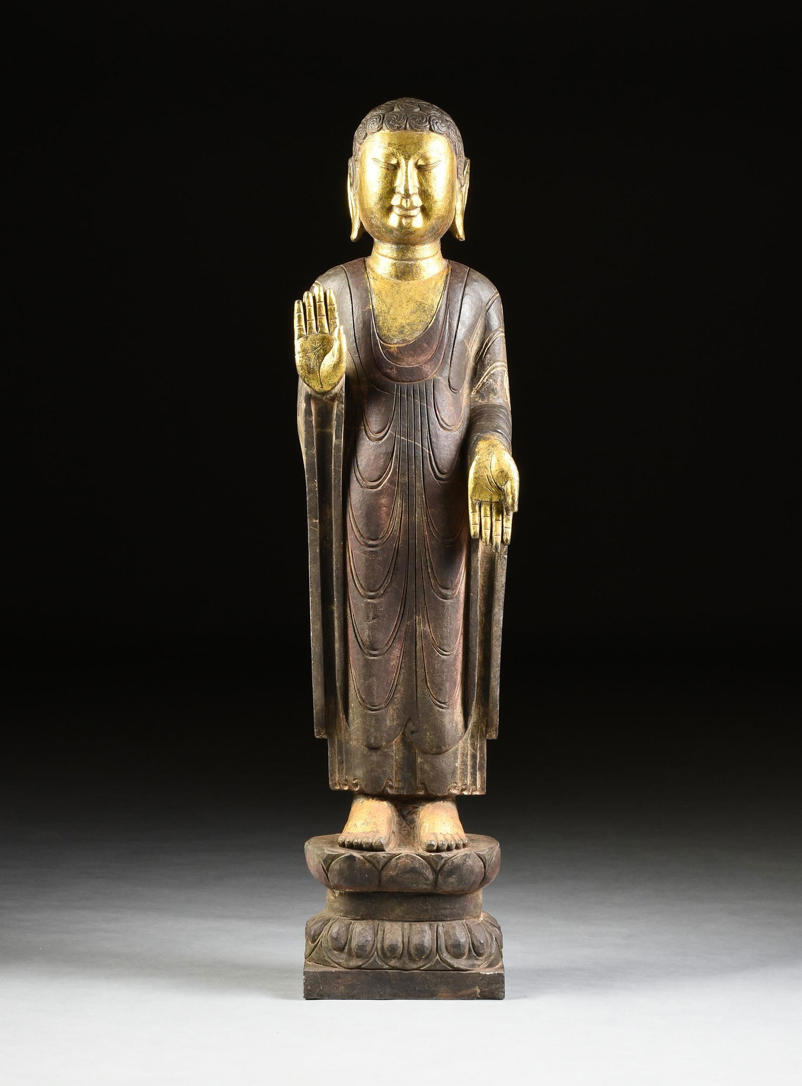 A CHINESE PARCEL GILT BLACK MARBLE ABHAYAMUDRA STANDING (1 of 9)