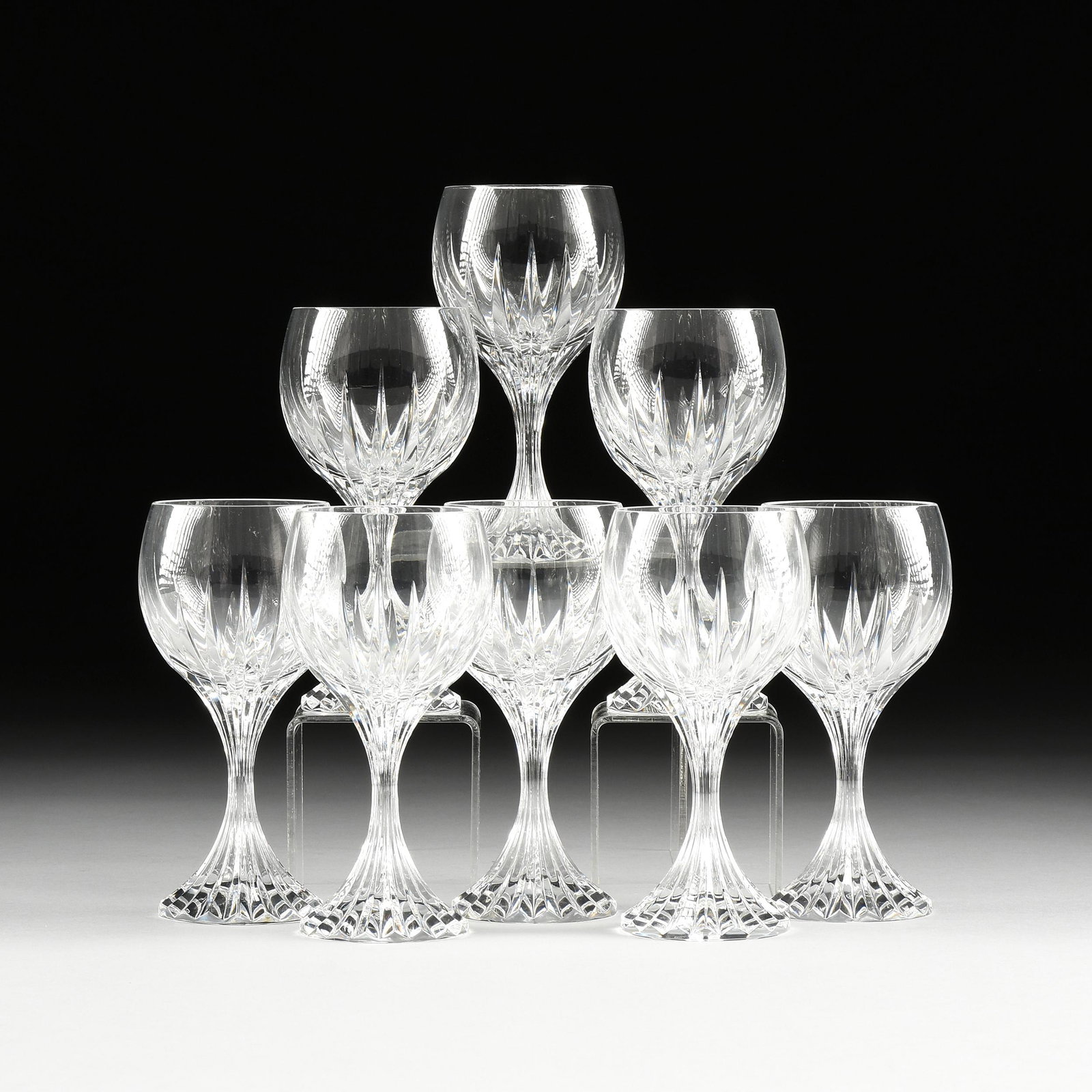 A SET OF EIGHT BACCARAT CUT CRYSTAL "MASSENA" RED WINE: A SET OF EIGHT BACCARAT CUT CRYSTAL "MASSENA" RED WINE GLASSES, SIGNED, MODERN, each in traditional Massena pattern, verso circular acid etched mark. Height: 6 3/8" Diameter: 3"
