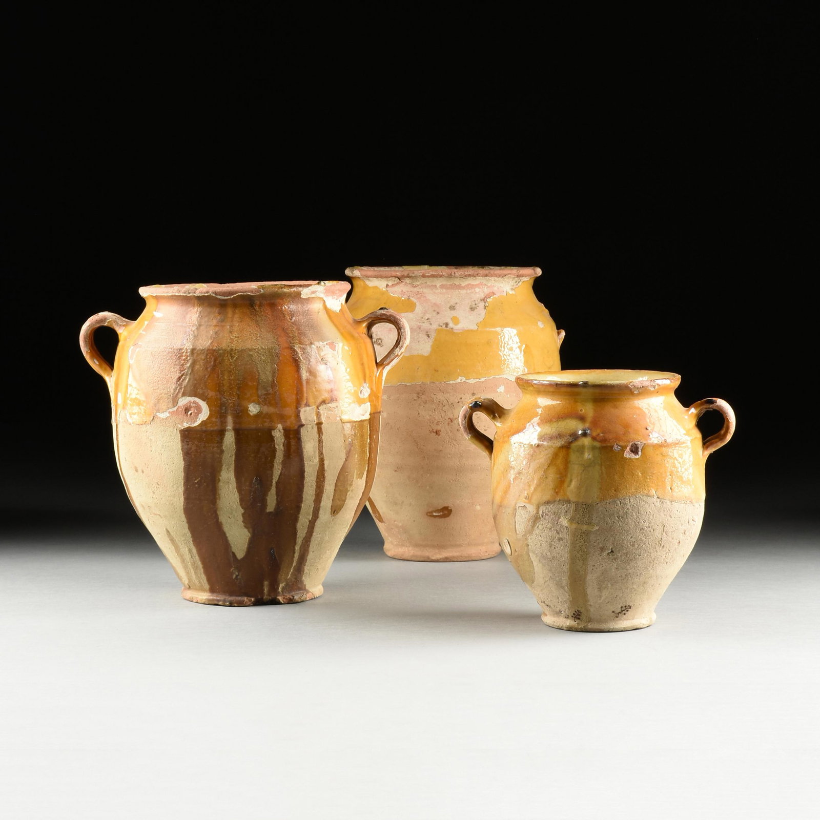 THREE FRENCH PROVINCIAL STYLE YELLOW GLAZED TERRACOTTA CONFIT JARS, 20TH CENTURY, (1 of 9)