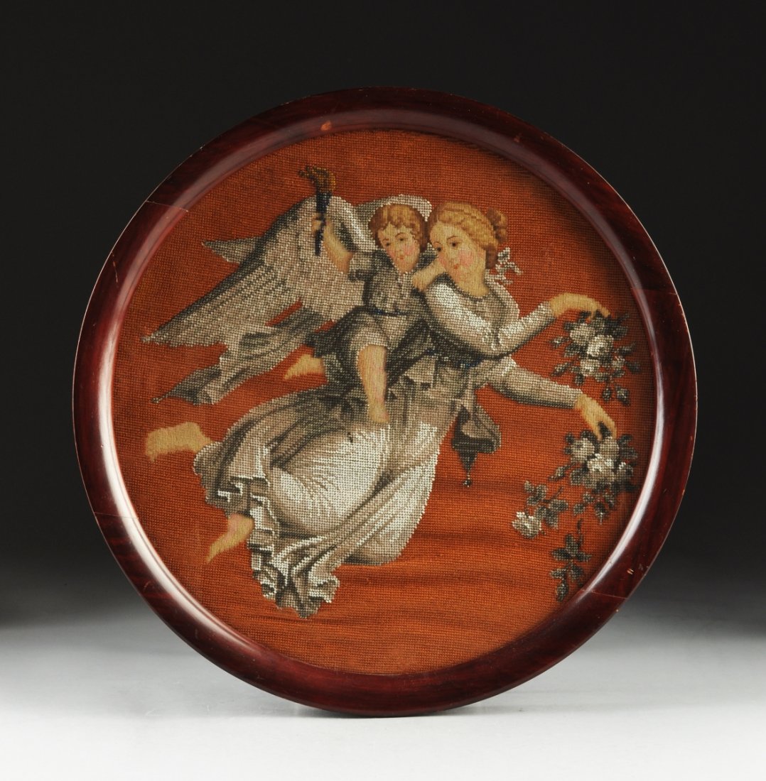 A ROUND BEADED NEEDLEPOINT PLAQUE OF AN ANGEL, 19TH: A ROUND BEADED NEEDLEPOINT PLAQUE OF AN ANGEL, 19TH CENTURY, depicting an angel with wings outstretched accompanied by a winged putti, the angel with long flowing robes.