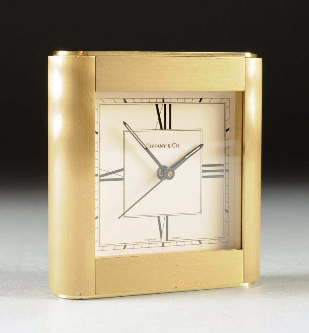A TIFFANY & CO. BRASS DESK CLOCK, Swiss made, signed