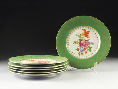 A SET OF SIX BOHEMIAN GREEN GROUND AND FLORAL DECORATED: A SET OF SIX BOHEMIAN GREEN GROUND AND FLORAL DECORATED PLATES, RED "F B CO" MAKER'S MARKS, CIRCA 1920, each with a broad green border enclosing parcel gilt floral sprays within shaped reserves