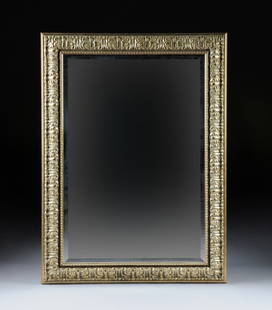 A GILT FRAMED BEVELED MIRROR, LATE 20TH CENTURY,: A GILT FRAMED BEVELED MIRROR, LATE 20TH CENTURY, acanthus leaf detailing to frame. Height: 42 5/8" Width: 30 5/8"