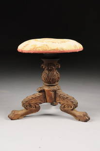 AN AMERICAN CLASSICAL CARVED ROSEWOOD STOOL, CIRCA: AN AMERICAN CLASSICAL CARVED ROSEWOOD STOOL, CIRCA 1830, the circular floral tapestry upholstered and padded seat on a stylized acanthus detailed pedestal, raised on foliate carved splayed legs