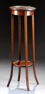 A SHERATON STYLE MAHOGANY PLANT STAND, 20TH CENTURY,: A SHERATON STYLE MAHOGANY PLANT STAND, 20TH CENTURY, the circular top enclosing a marquetry stylized fan inlaid medallion within paired boxwood strung inlay raised on rectangular legs similarly