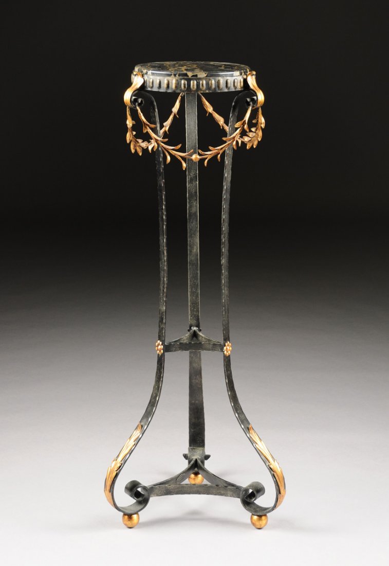 A ROCOCO REVIVAL MARBLE TOPPED DECORATIVE PEDESTAL,: A ROCOCO REVIVAL MARBLE TOPPED DECORATIVE PEDESTAL, 20TH CENTURY, the round black marble top with sand colored brecciated veining, supported by scrolling tripodal legs with dual triangular stretchers,