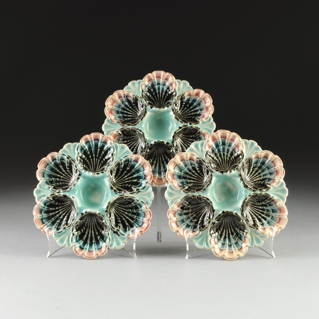 A SET OF TWELVE FRENCH POLYCHROME ENAMELED FAIENCE: A SET OF TWELVE FRENCH POLYCHROME ENAMELED FAIENCE OYSTER PLATES, IMPRESSED MARKS AND NUMBERS, LATE 19TH CENTURY, each of turquoise ground with molded oyster shells painted in dark green shading to bl