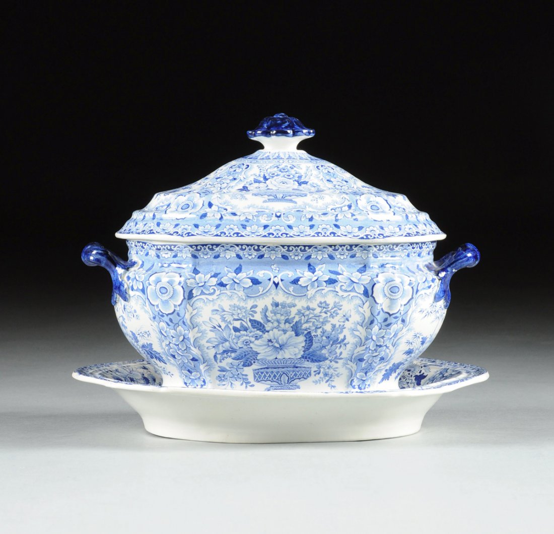A NANKEEN SEMI CHINA COVERED TUREEN AND UNDERPLATE,: A NANKEEN SEMI CHINA COVERED TUREEN AND UNDERPLATE, PROBABLY MINTON, ENGLAND, CIRCA 1830, the oval canted corner two-handled tureen on spreading conforming foot with domed cover and matching underplat