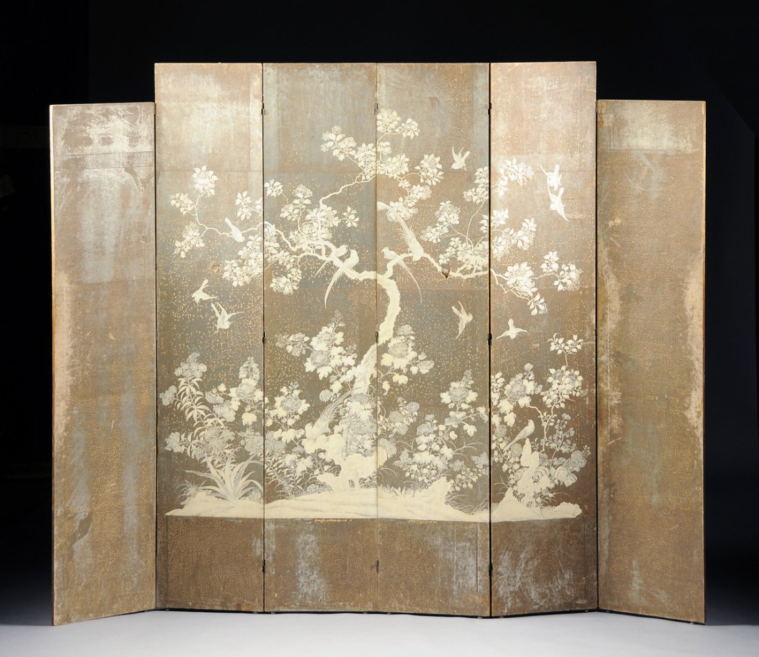 A JAPANESE MONOCHROME PAINTED SILVER LEAF SIX PANEL: A JAPANESE MONOCHROME PAINTED SILVER LEAF SIX PANEL SCREEN, POSSIBLY EDO PERIOD, 18TH/19TH CENTURY, the finely painted central panels depicting various species of birds fluttering amidst and resting i