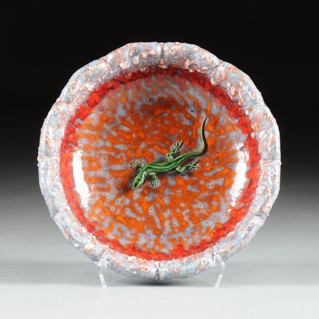 A PALISSY WARE FIGURAL CERAMIC BOWL BY GEOFFREY LUFF,: A PALISSY WARE FIGURAL CERAMIC BOWL BY GEOFFREY LUFF, FRANCE, 20TH CENTURY, the open tin glazed earthenware bowl with blue/gray shaped lobed shell encrusted rim, layered and mottled red, orange, blue