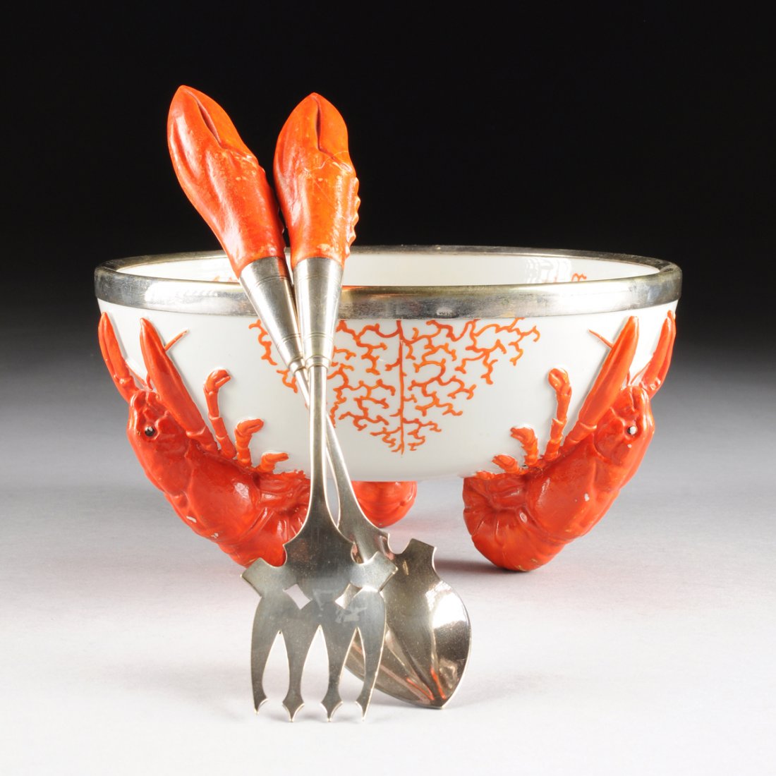 A GERMAN SILVER PLATE MOUNTED POLYCHROME DECORATED: A GERMAN SILVER PLATE MOUNTED POLYCHROME DECORATED LOBSTER SALAD BOWL AND SERVING UTENSILS, BY THE WUERTTEMBERGISCHE METALLWAREN FABRIK COMPANY, IMPRESSED AND OVERGLAZE MAKER'S MARKS, 20TH CENTURY, th