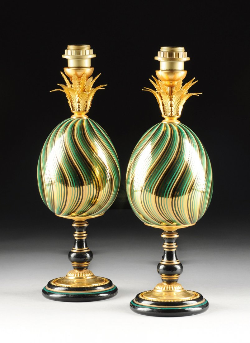 A PAIR OF HOLLYWOOD REGENCY STYLE POLYCHROME PAINTED: A PAIR OF HOLLYWOOD REGENCY STYLE POLYCHROME PAINTED AND PARCEL GILT OSTRICH EGG FORM LAMPS, SIGNED "F.D," LATE 20TH CENTURY, each of ovoid form with green shading to black striated line decoration on