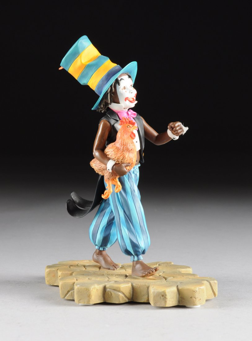 A THOMAS BLACKSHEAR CAST RESIN FIGURE FROM THE EBONY: A THOMAS BLACKSHEAR CAST RESIN FIGURE FROM THE EBONY VISIONS SERIES "JAY JAY AND CLUCK," CIRCA 1999, of an African-American boy wearing a striped top hat and matching trousers, vest and shirt front wi