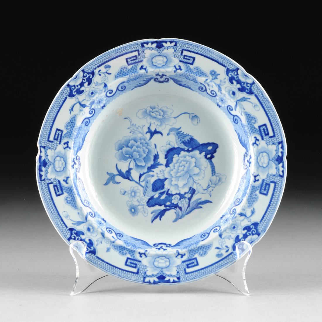 A SET OF TEN MASON'S PATENT IRONSTONE BLUE AND WHITE: A SET OF TEN MASON'S PATENT IRONSTONE BLUE AND WHITE TRANSFER PRINT SOUP PLATES, "BLUE PHEASANTS" PATTERN, FENTON, STAFFORDSHIRE, ENGLAND, CIRCA 1813-1820, the scalloped rim soup plates with medium bl