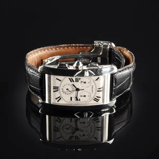 AN 18K CARTIER TANK AMERICAINE GENT'S WATCH,: AN 18K CARTIER TANK AMERICAINE GENT'S WATCH, style 2312, large size with Swiss quartz movement and classic Cartier Roman numeral dial, signed Cartier dial at 6 along with micro signature at 10 o'clock