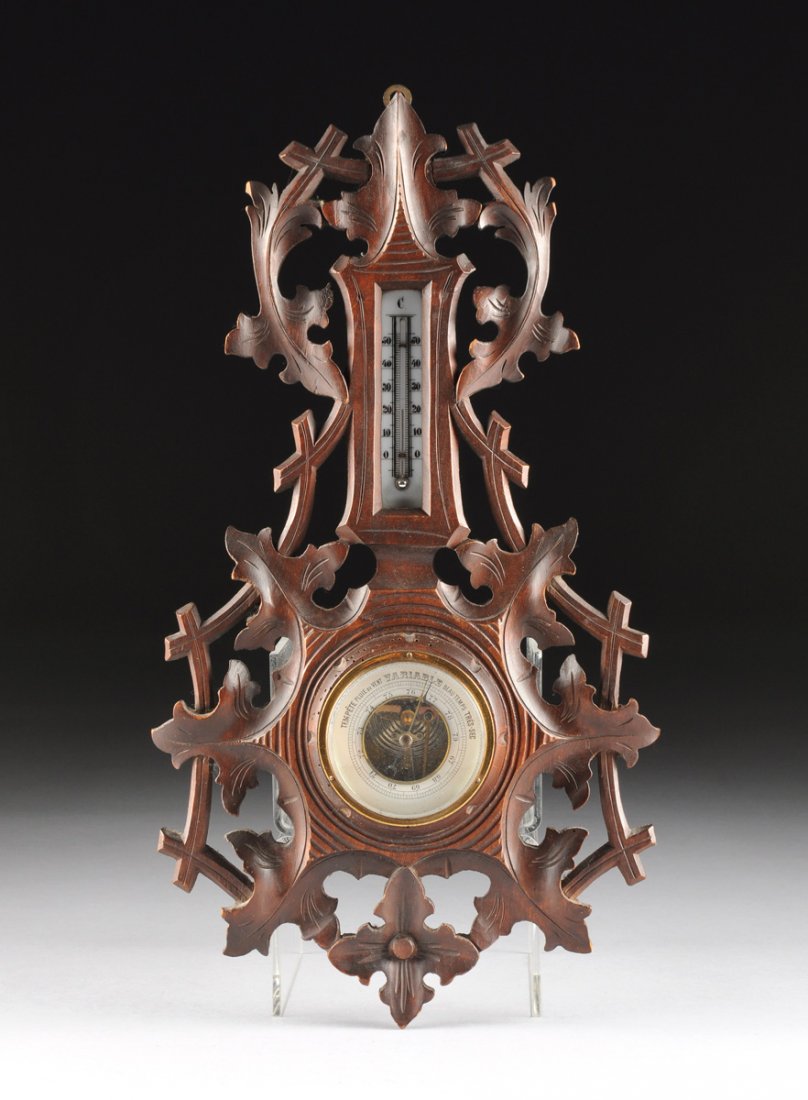 A CARVED OAK BLACK FOREST WALL HUNG ANEROID BAROMETER,  (1 of 6)