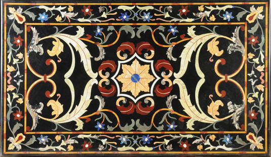 A RENAISSANCE STYLE PIETRA DURA INLAID BLACK MARBLE TAB: A RENAISSANCE STYLE PIETRA DURA INLAID BLACK MARBLE TABLE TOP, LATE 20TH CENTURY, of rectangular form and centering a large conforming panel inlaid with lapis, agate, griotte rouge, siena and various