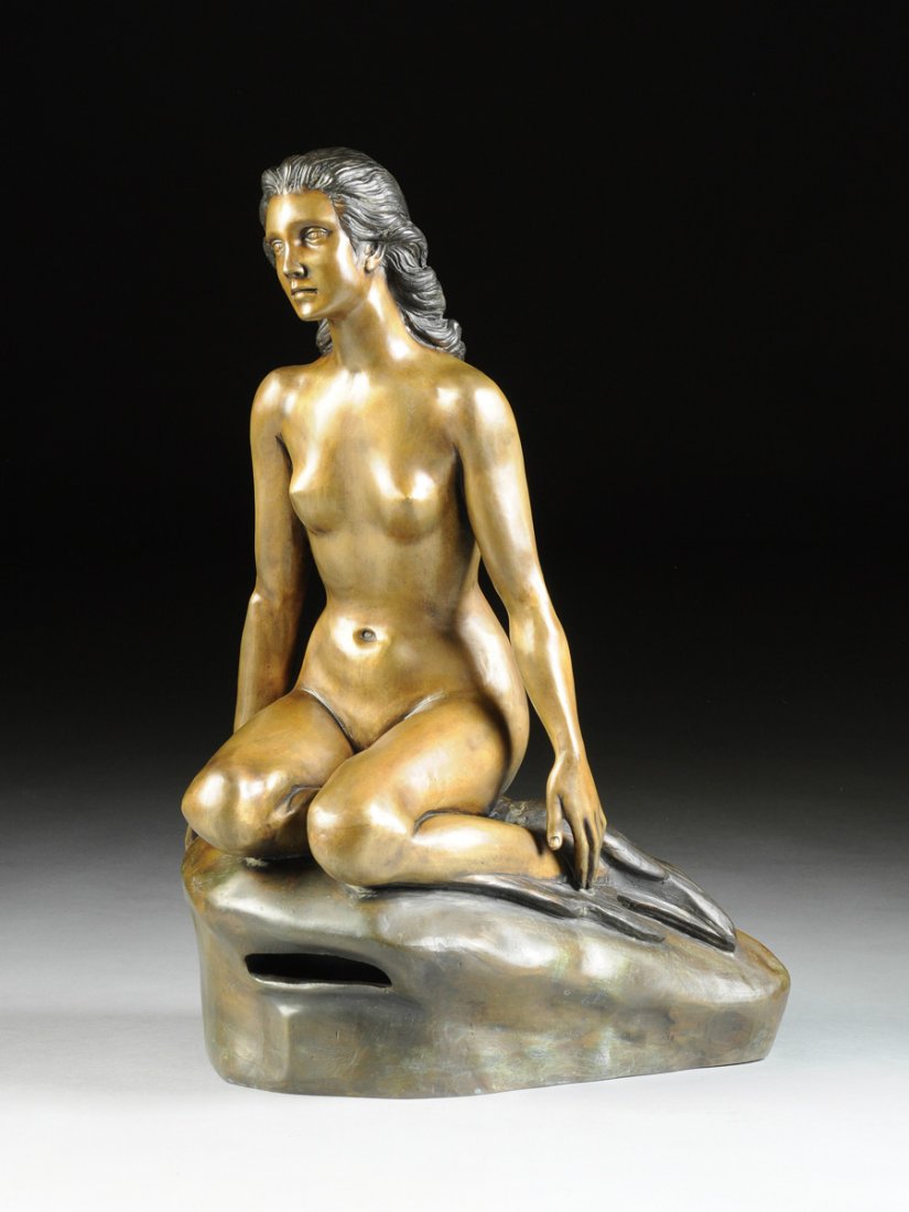 A PATINATED BRONZE SCULPTURE OF A SEA MAIDEN, NUDE,: A PATINATED BRONZE SCULPTURE OF A SEA MAIDEN, NUDE, MODERN, modeled in a seated position atop a rock, with individual flippers or fins instead of feet. Height: 28" Width: 21"