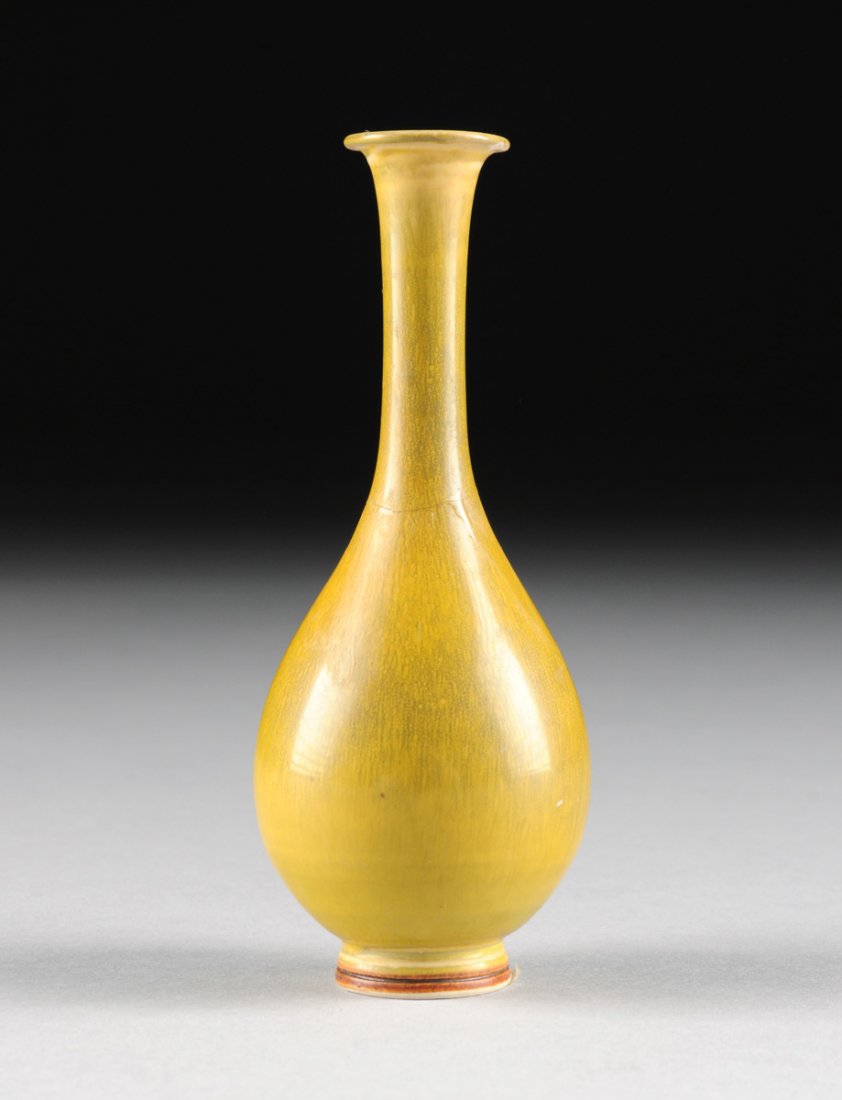 A BERNDT FRIBERG (SWEDISH, 1899-1981) STONEWARE CABINET: A BERNDT FRIBERG (SWEDISH, 1899-1981) STONEWARE CABINET VASE, FOR GUSTAVSBERG, GUSTAVSBERG, SWEDEN, CIRCA 1953, of elongated baluster form with yellow ochre haresfur glaze, marks: "FRIBERG," (hand wit