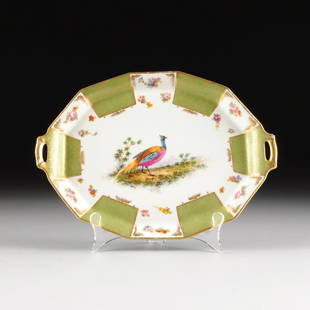 A LIMOGES TRANSFER PRINTED AND HAND PAINTED PORCELAIN: A LIMOGES TRANSFER PRINTED AND HAND PAINTED PORCELAIN PLATTER, RETAILED BY LEWIS STRAUS AND SONS, ARTIST SIGNED, OVERGLAZE MARK, CIRCA 1890's-1920's, the small twelve sided serving dish with gilt rim