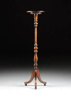 A FEDERAL STYLE CARVED MAHOGANY PEDESTAL, MODERN,: A FEDERAL STYLE CARVED MAHOGANY PEDESTAL, MODERN, with a circular dish shape top on a compressed bun and baluster detailed shaft, raised on splayed rectangular tripod legs ending in ball form feet.