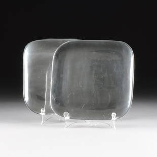 A PAIR OF NAMBE POLISHED METAL SERVING TRAYS, SIGNED,: A PAIR OF NAMBE POLISHED METAL SERVING TRAYS, SIGNED, NUMBERED 555, LATE 20TH CENTURY, each of rounded square form and reversing to impressed, "nambe/555." Width: 10 7/8" Depth: 10 7/8"
