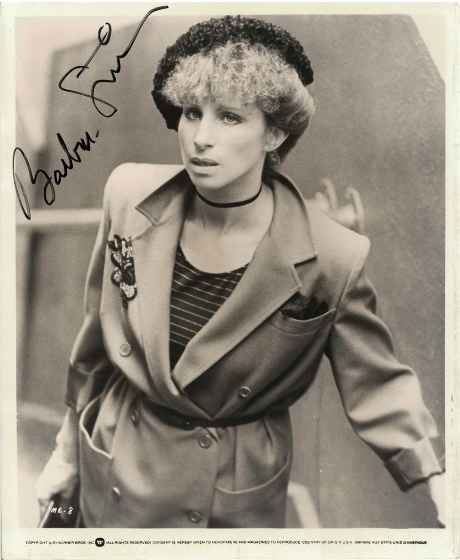 A BARBRA STREISAND AUTOGRAPHED 8' X 10" BLACK AND WHITE: A BARBRA STREISAND AUTOGRAPHED 8' X 10" BLACK AND WHITE PHOTOGRAPH, a Warner Brothers publicity photo of Streisand as Esther Hoffman in the 1976 film A Star is Born signed in black marker. Height: 10"