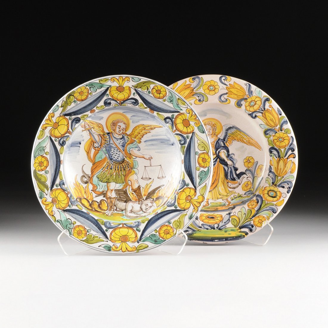 A PAIR OF LARGE CIRCULAR POLYCHROME PAINTED AND GLAZED (1 of 8)