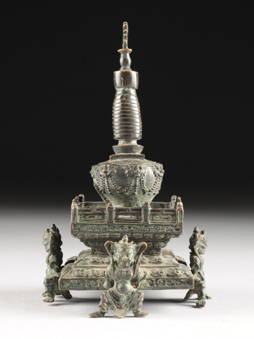 A SINO TIBETAN PATINATED BRONZE BUDDHISTIC STUPA FORM (1 of 9)