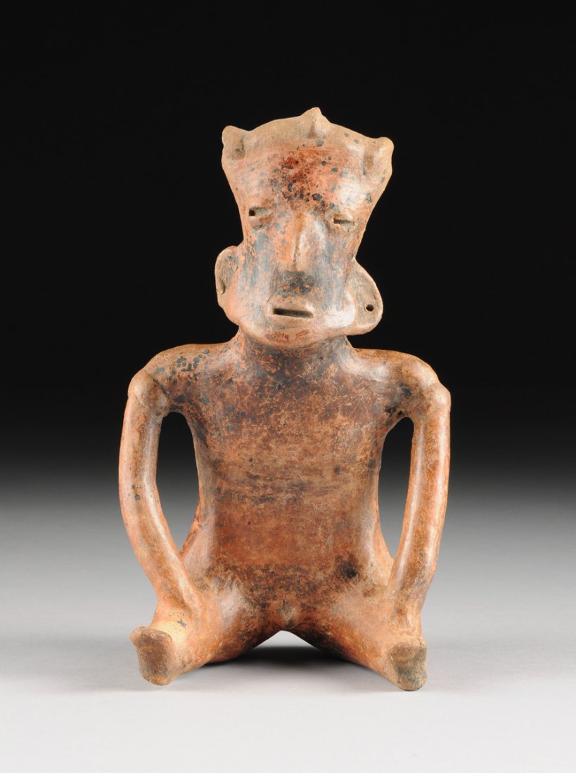 A PRE-COLUMBIAN SEATED MALE FIGURE, POSSIBLY JALISCO, (1 of 9)