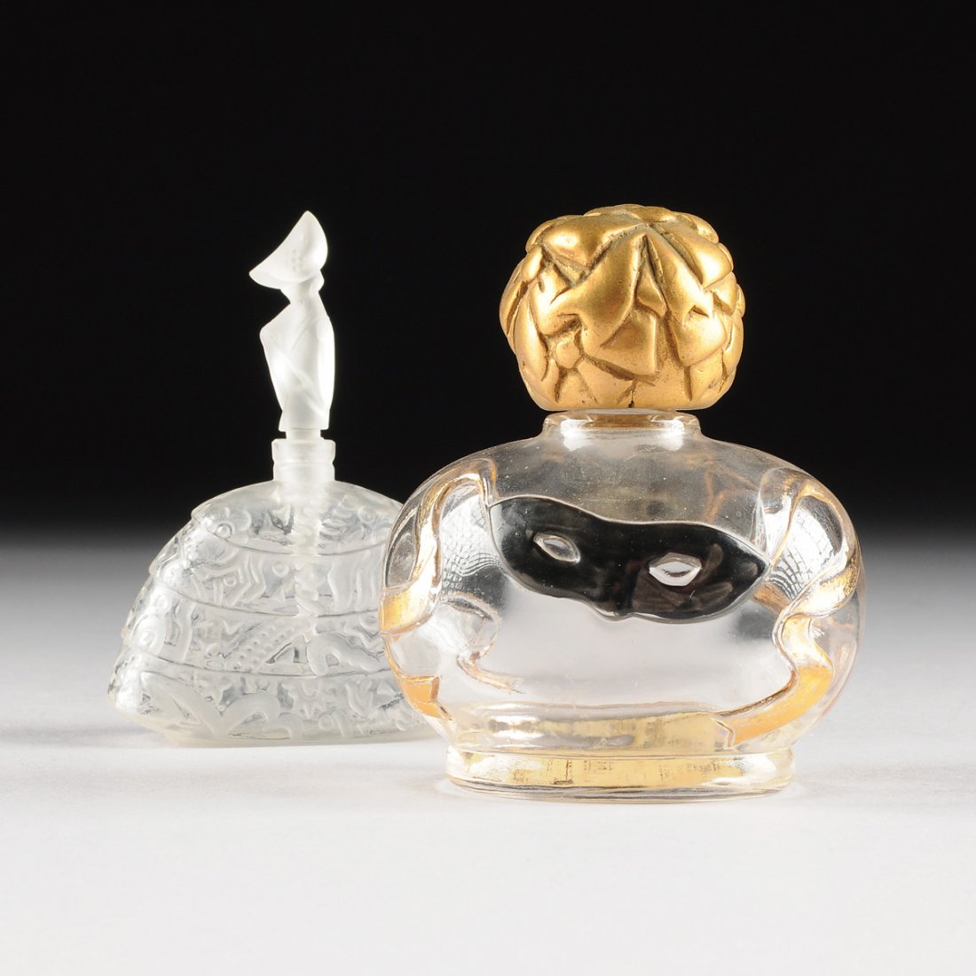 TWO VINTAGE GLASS DESIGNER PERFUME BOTTLES, CIRCA FIRST (1 of 10)