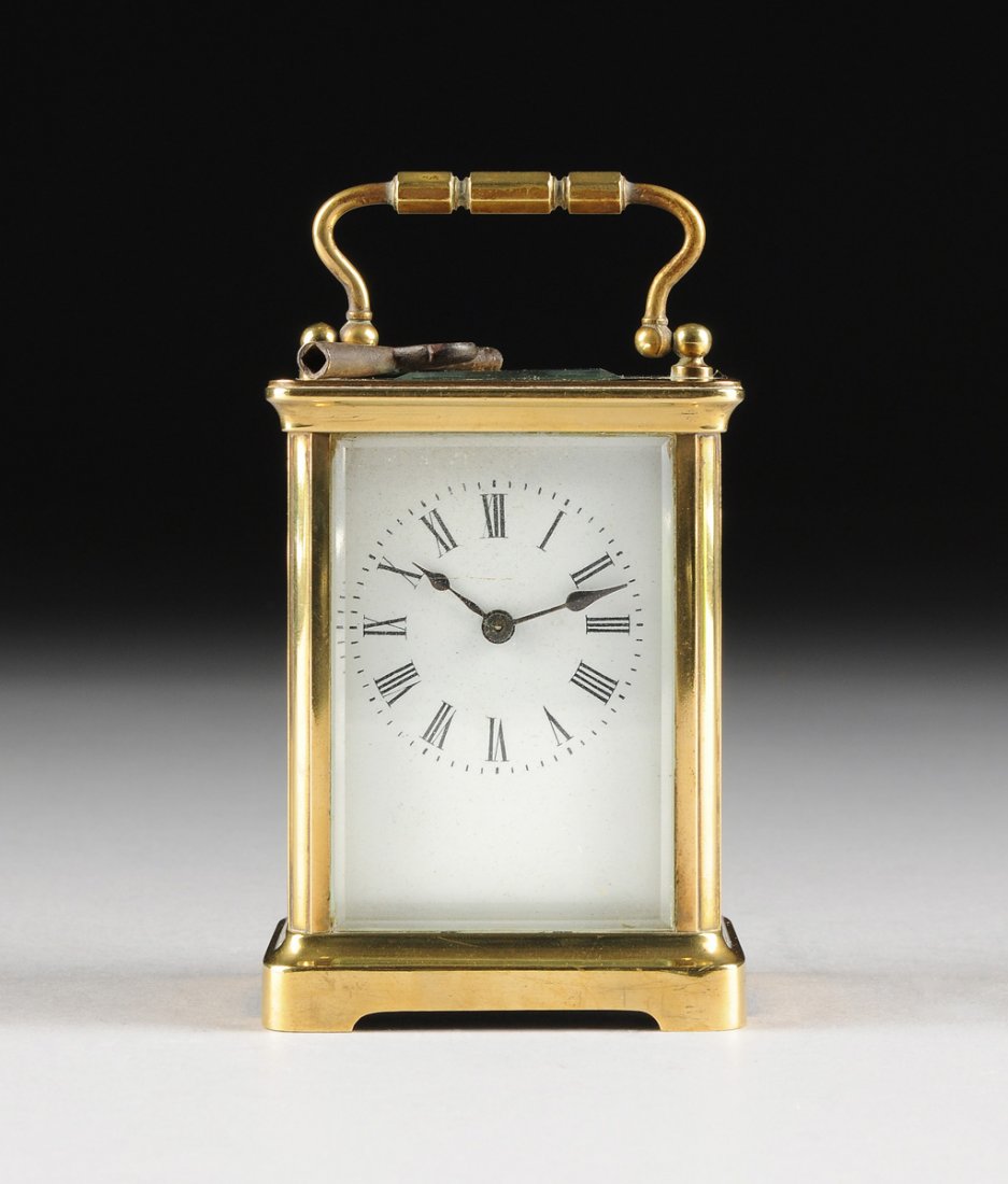 AN ANTIQUE FRENCH POLISHED BRASS CARRIAGE CLOCK, BY R & (1 of 6)