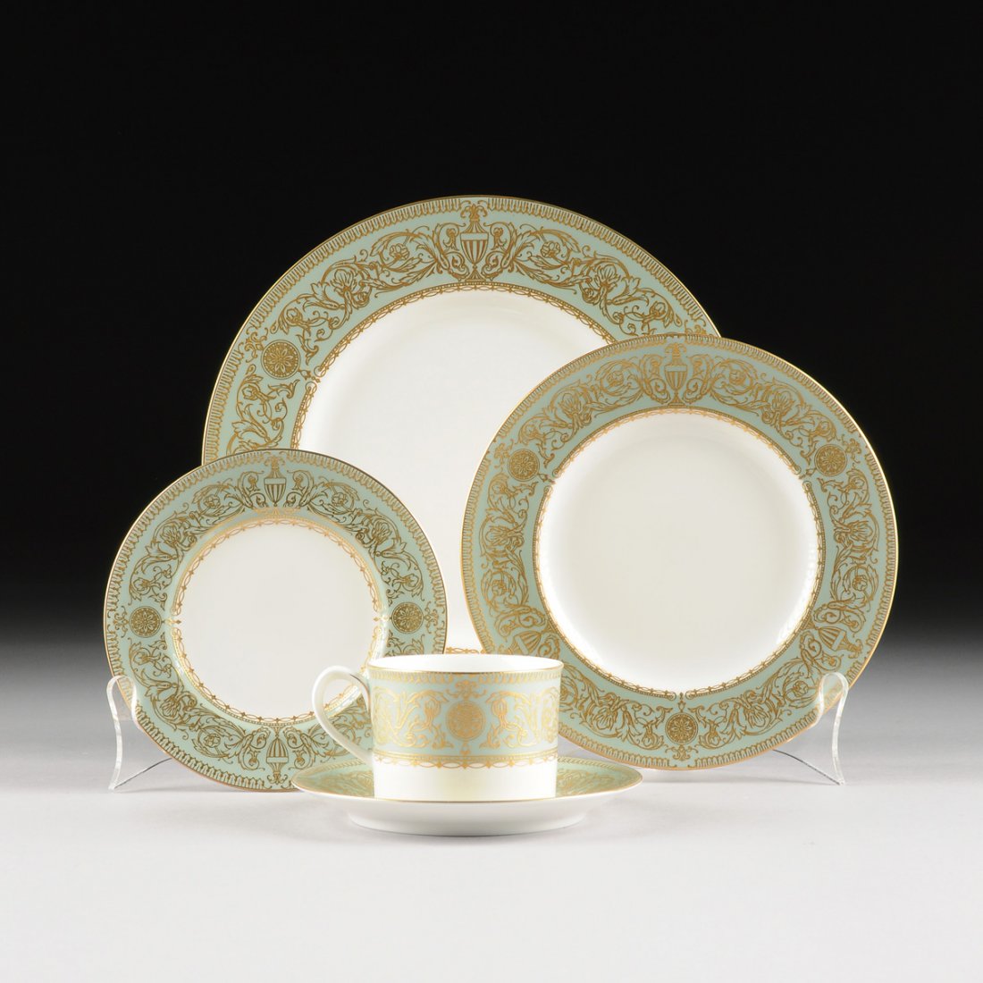 A SEVENTY PIECE ROYAL WORCESTER FINE BONE CHINA DINNER: A SEVENTY PIECE ROYAL WORCESTER FINE BONE CHINA DINNER SERVICE, BALMORAL GREEN PATTERN, OVERGLAZE GILT MARKS, 1966, each with traditional gilt decoration on a pale green ground, reversing to circular 
