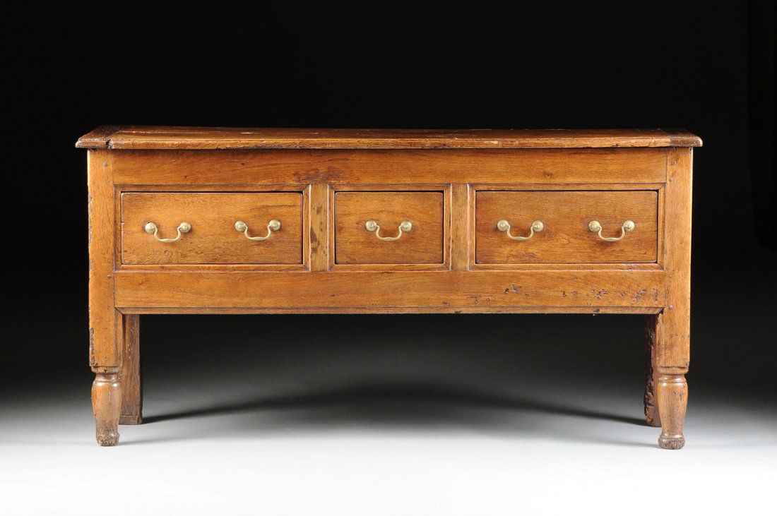 A FRENCH PROVINCIAL CARVED WALNUT AND OAK SIDEBOARD, (1 of 10)