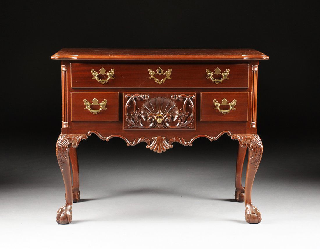 A CHIPPENDALE STYLE CARVED MAHOGANY LOWBOY, BY A.F. (1 of 6)