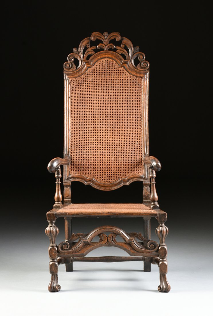 A BAROQUE CARVED AND CANED WALNUT ARMCHAIR, POSSIBLY (1 of 10)