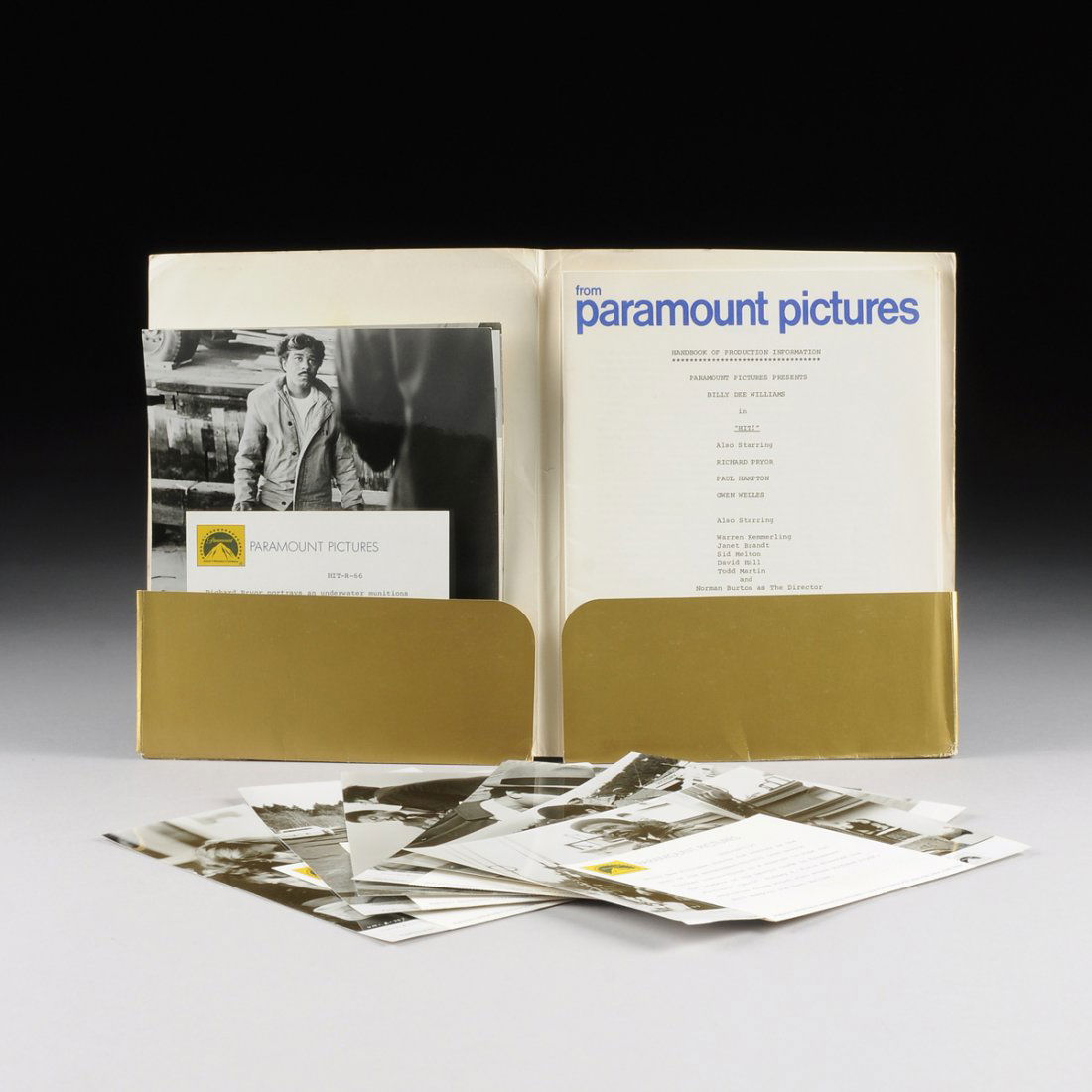 A STUDIO PRESSBOOK AND THREE 8" X 10" COLOR LOBBY CARDS (1 of 6)