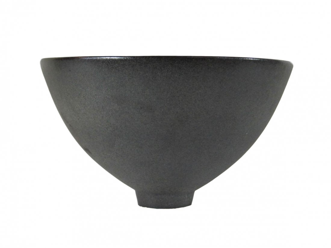James Lovera Bowl: Black satin finish studio pottery bowl by California artist James Lovera, (California 1920-2015). Glazed porcelain. Measures 5.5" x 8.5" About the artist: James Lovera studied and worked with the Gert