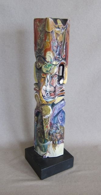 Rolando Castellon, surrealist sculpture in wood: Rolando Castellon (Nicaraguan, b.1937- ) Untitled - Surrealist totem Painted, carved wood sculpture c.1960-70’s 23” tall Good overall condition, two small areas of paint loss/damage (illustrated) 
