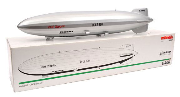 A late 1990’s Marklin tinplate model of ‘Graf: A late 1990’s Marklin tinplate model of ‘Graf Zeppelin’. (11400). A special edition 1859-1999. Painted in silver with ‘Graf Zeppelin’ in red, ‘D-LZ 130’ in black. Unusually purporting to