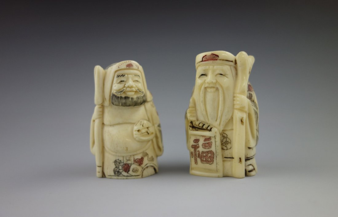 PAIR OF JAPANESE IVORY NETSUKE: Pair of Japanese Ivory Netsuke, finely carved to depict different elders, marked underside. Size: '' H x '' W
