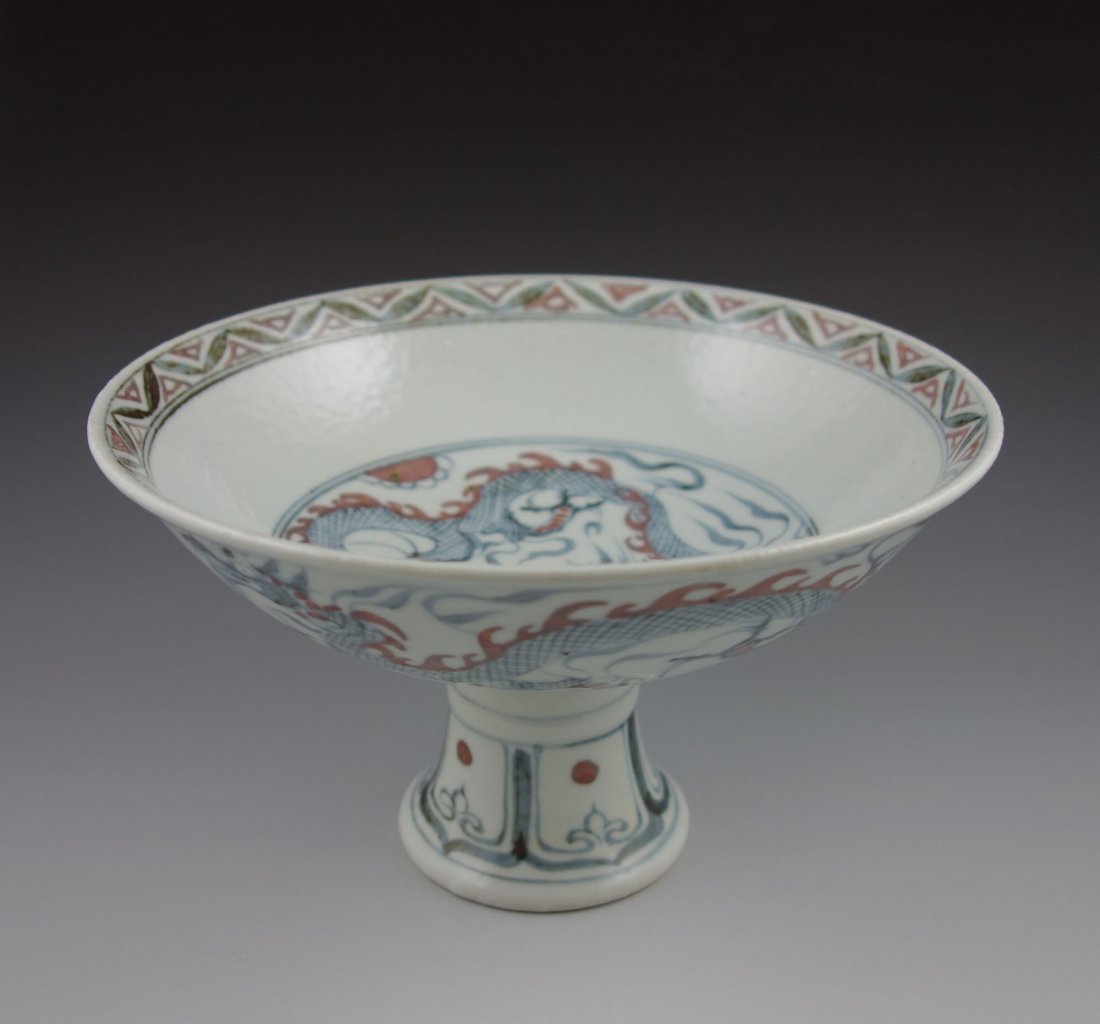 CHINESE PORCELAIN STEM CUP: Chinese hand painted porcelain stem cup with dragon designs to the exterior and interior, Ming Dynasty, the interior of the stem holds six character calligraphy mark: Da Ming Jian Wen Nian Zhi. Size: 