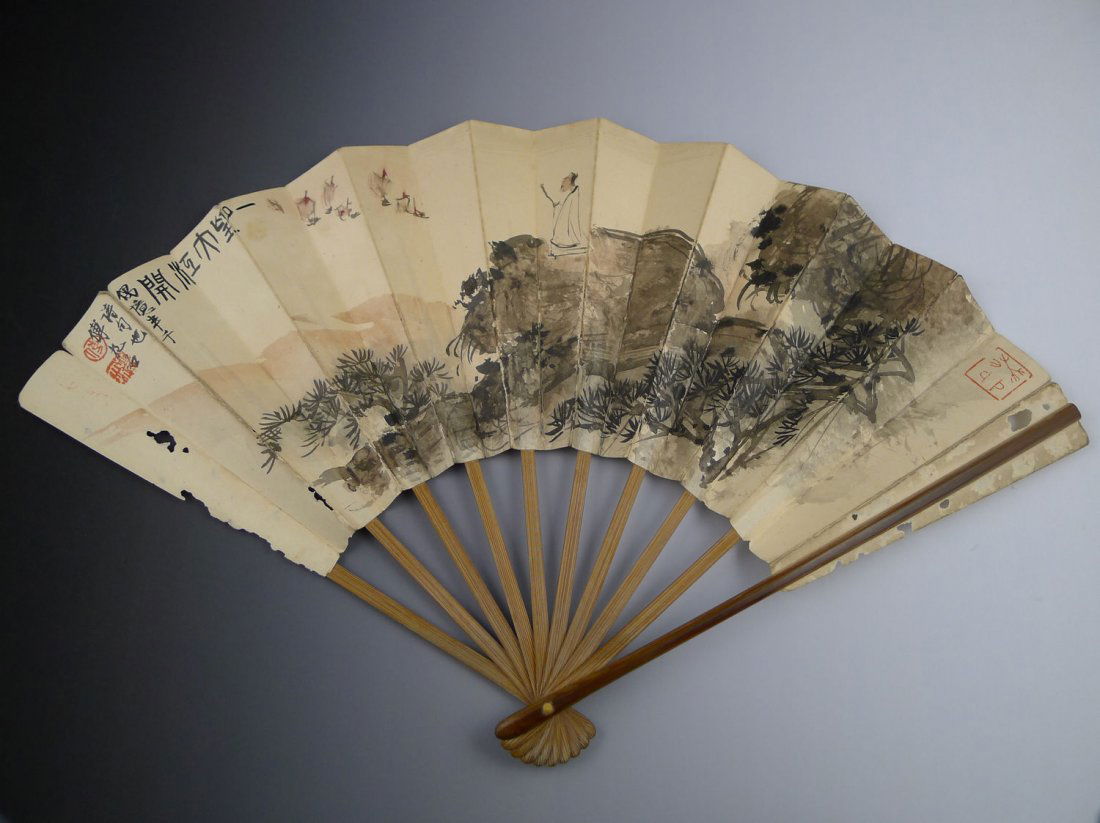 CHINESE PAINTED FAN BY FU BAOSHI: Chinese ink and wash painting fan, signed Fu Baoshi (1904 – 1965); depicting two figures in boat beneath tree; inscription and two seal marks; Fu Baoshi is the most original figure painter and lands