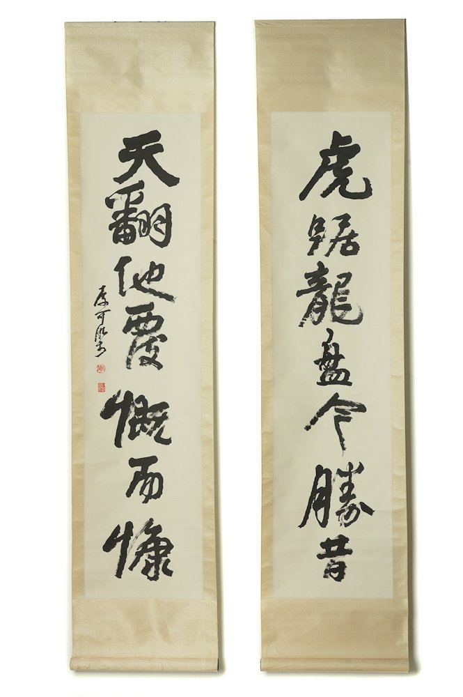 LI KERAN CALLIGRAPHY COUPLET: Li Keran (1907 – 1989), was a renowned contemporary Chinese painter and art educator. He was a prominent figure in 20th-century Chinese art. Signed in Chinese [Ink on paper] Stamped in red ink [arti
