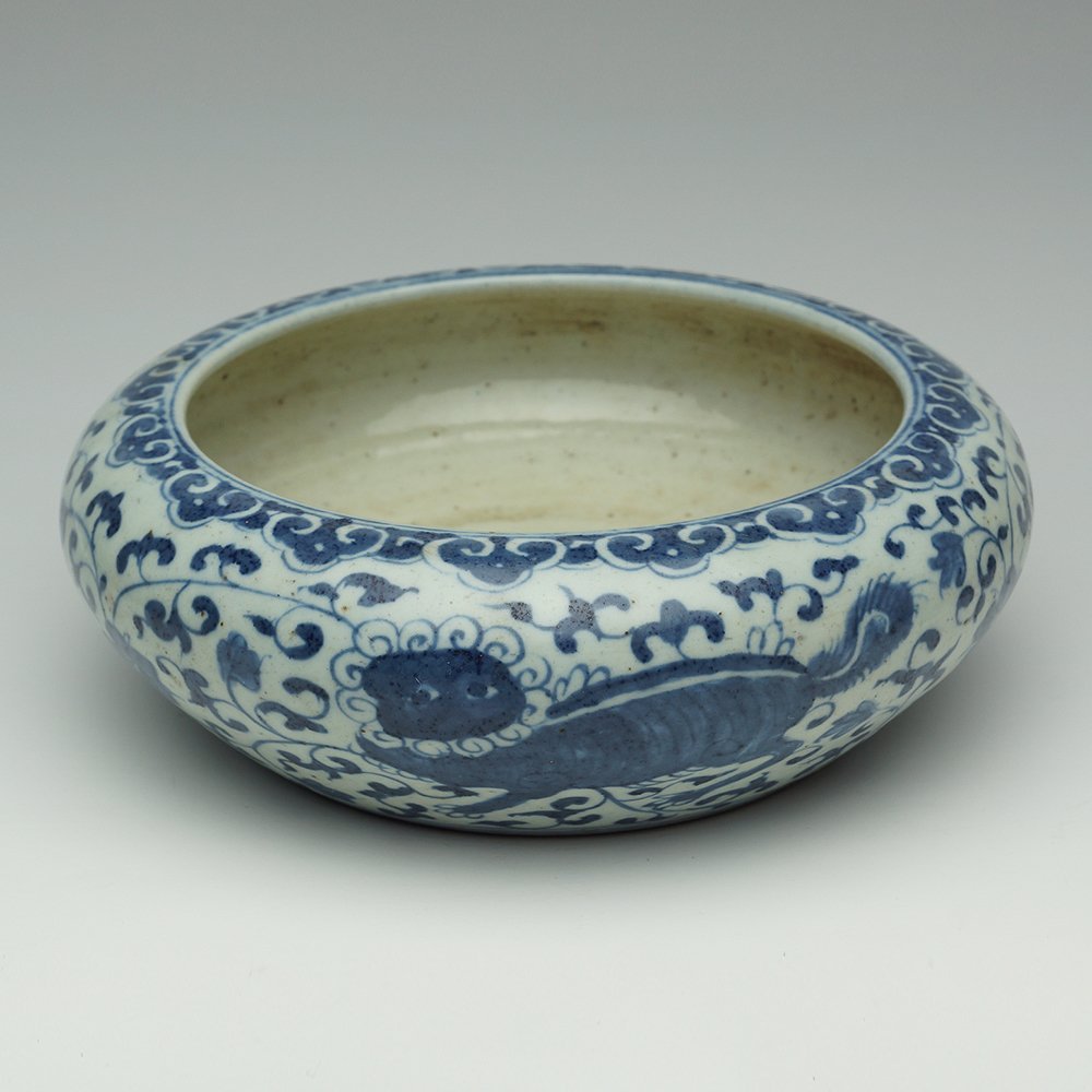 CHINESE BLUE AND WHITE BRUSH WASHER: Chinese blue and white brush washer, such under glaze blue against white body allow the pure and beautiful qualities to stand out. H:2.75. D:7.5"