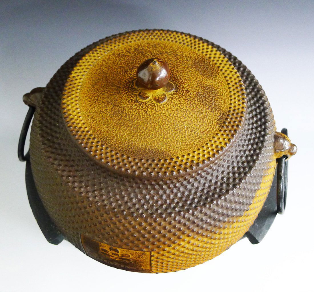 VINTAGE JAPANESE KAMA WITH TRIVET: This cast iron "Kama" is used in the Japanese tea ceremony or "chanoyu" for heating water. It has two identical "Chinah - So" stamp on both sides of the body. The Kama has a cast iron lid and is in ex