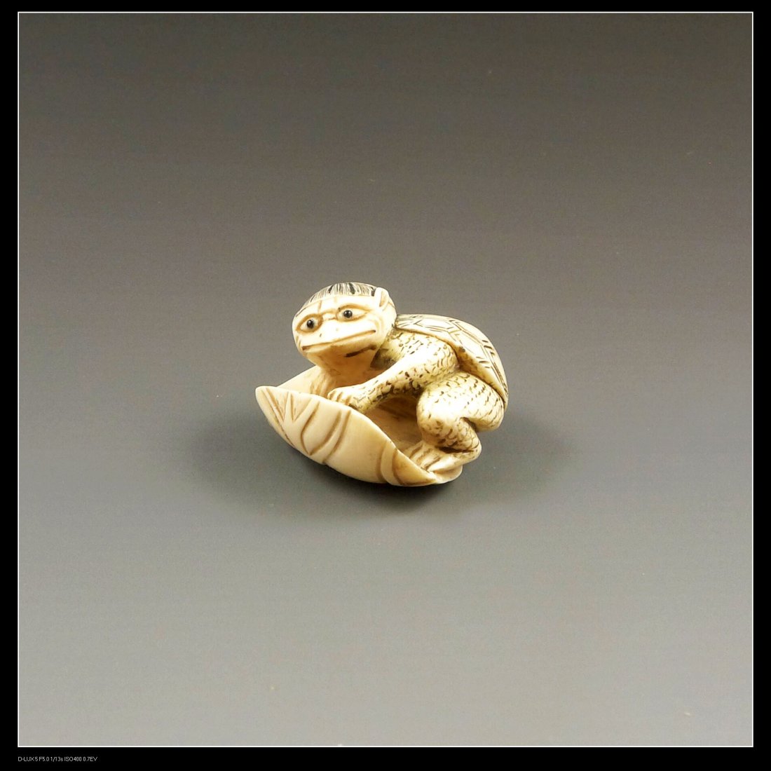 VINTAGE JAPANESE IVORY NETSUKE: Japanese Ivory Netsuke, finely carved boy design. Size: 24mm. H x 23mm.W