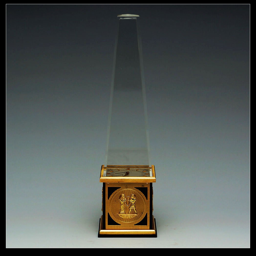 VINTAGE LECOULTRE EGYPTIAN OBELISK 8-DAY CLOCK: A great clock by the world re-known firm of Jaeger Le-Coultre, maker of some of the world's most luxurious clocks and watches. This clock is in the form of an Egyptian Obelisk and has a Lucite top. Th