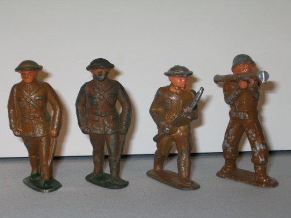 AMERICAN ALLOY/TOY CREATIONS LEAD SOLDIERS, 4 TOTA: AMERICAN ALLOY/TOY CREATIONS LEAD SOLDIERS, 4 TOTAL. (1-2) OFFICER, AA1. (3) SOLDIER CHARGING WIT RIFLE, TC4. (4) SOLDIER WITH BAZOOKA, WWII HELMET, TC10, BAZOOKA HAS CRACK ON ONE END. ALL HAVE PAINT